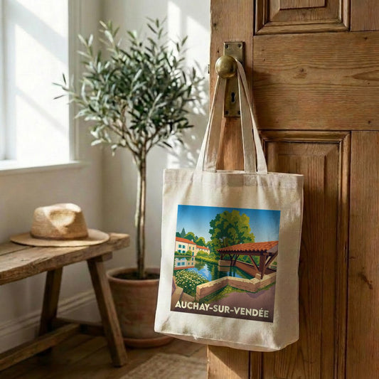 Tote bag souvenir de la ville de Auchay-sur-Vendée avec une illustration colorée et stylisée.