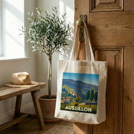 Tote bag souvenir de la ville d'Aussillon avec une illustration de paysage colorée.
