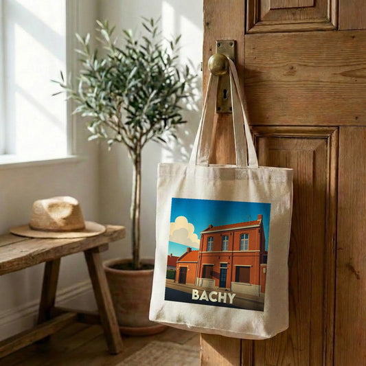 Tote bag souvenir de la ville de Bachy avec une illustration stylisée d'un bâtiment typique.