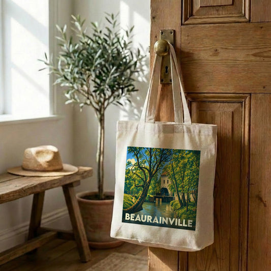 Tote bag souvenir de la ville de Beaurainville avec une illustration stylisée d'un paysage fluvial.