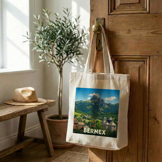 Tote bag souvenir de la ville de Bernex illustré d'un paysage de montagne stylisé.