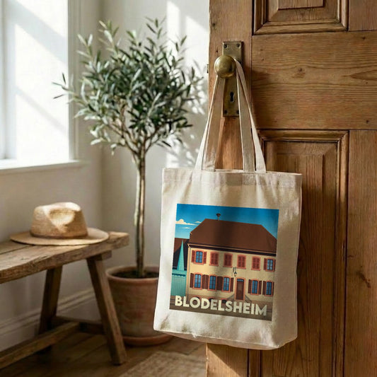 Tote bag souvenir de la ville de Blodelsheim avec une illustration stylisée.