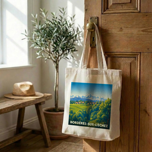 Tote bag souvenir de la ville de Bordères-sur-l'Échez avec une illustration stylisée de paysages montagneux.