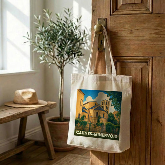Tote bag souvenir de la ville de Caunes-Minervois avec une illustration stylisée.