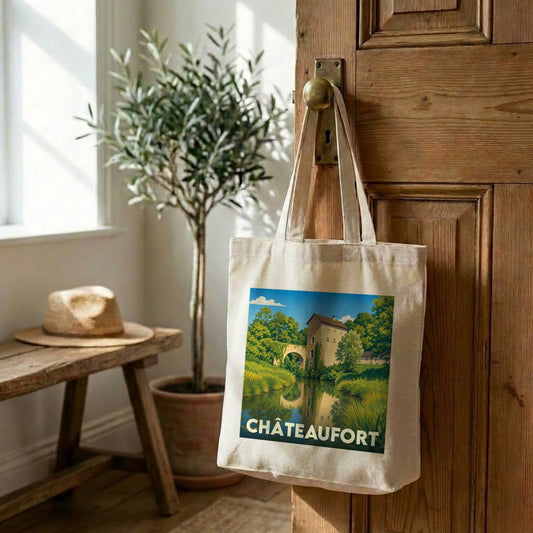Tote bag souvenir de la ville de Châteaufort avec une illustration stylisée d'un paysage historique.