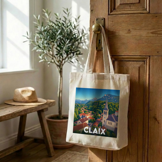 Tote bag souvenir de la ville de Claix orné d'une illustration stylisée du village et des montagnes.