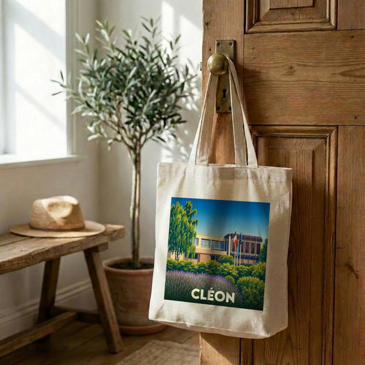 Tote bag souvenir de la ville de Cléon avec une illustration stylisée et colorée.