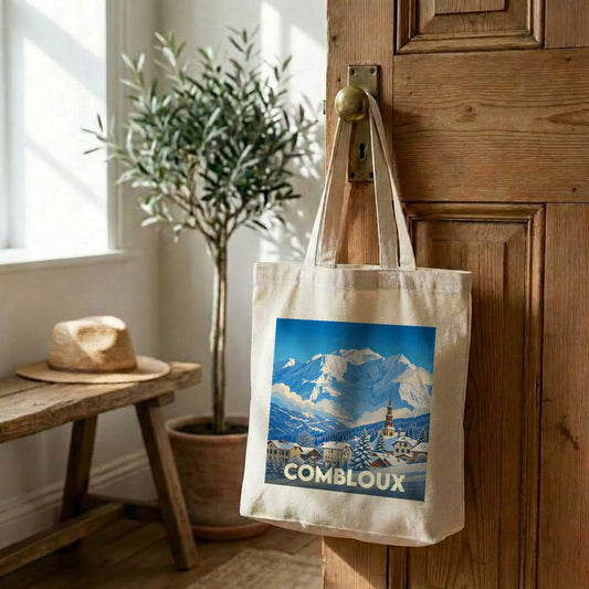 Tote bag souvenir de la ville de Combloux avec une illustration de paysage enneigé.
