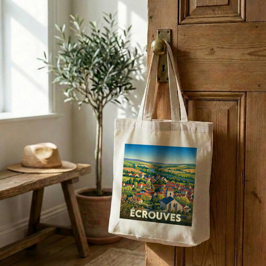 Tote bag souvenir de la ville d'Écrouves avec une illustration paysagère stylisée.