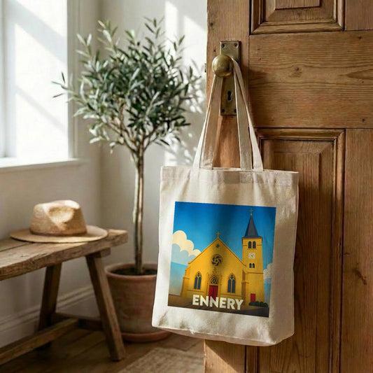 Tote bag souvenir de la ville d'Ennery avec une illustration stylisée de son église.