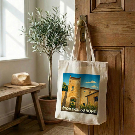 Tote bag souvenir de la ville de Étoile-sur-Rhône avec une illustration stylisée d'un bâtiment historique.