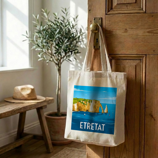 Tote bag souvenir de la ville d'Étretat avec une illustration stylisée de ses falaises.