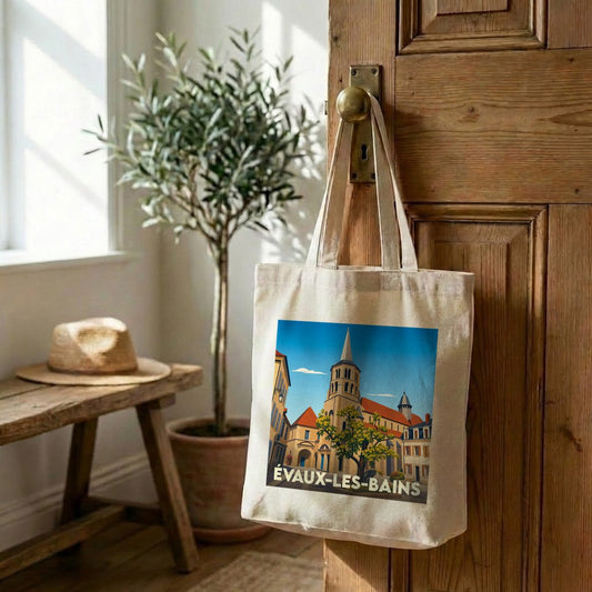 Tote bag souvenir de la ville d'Évaux-les-Bains avec une illustration stylisée de son patrimoine.