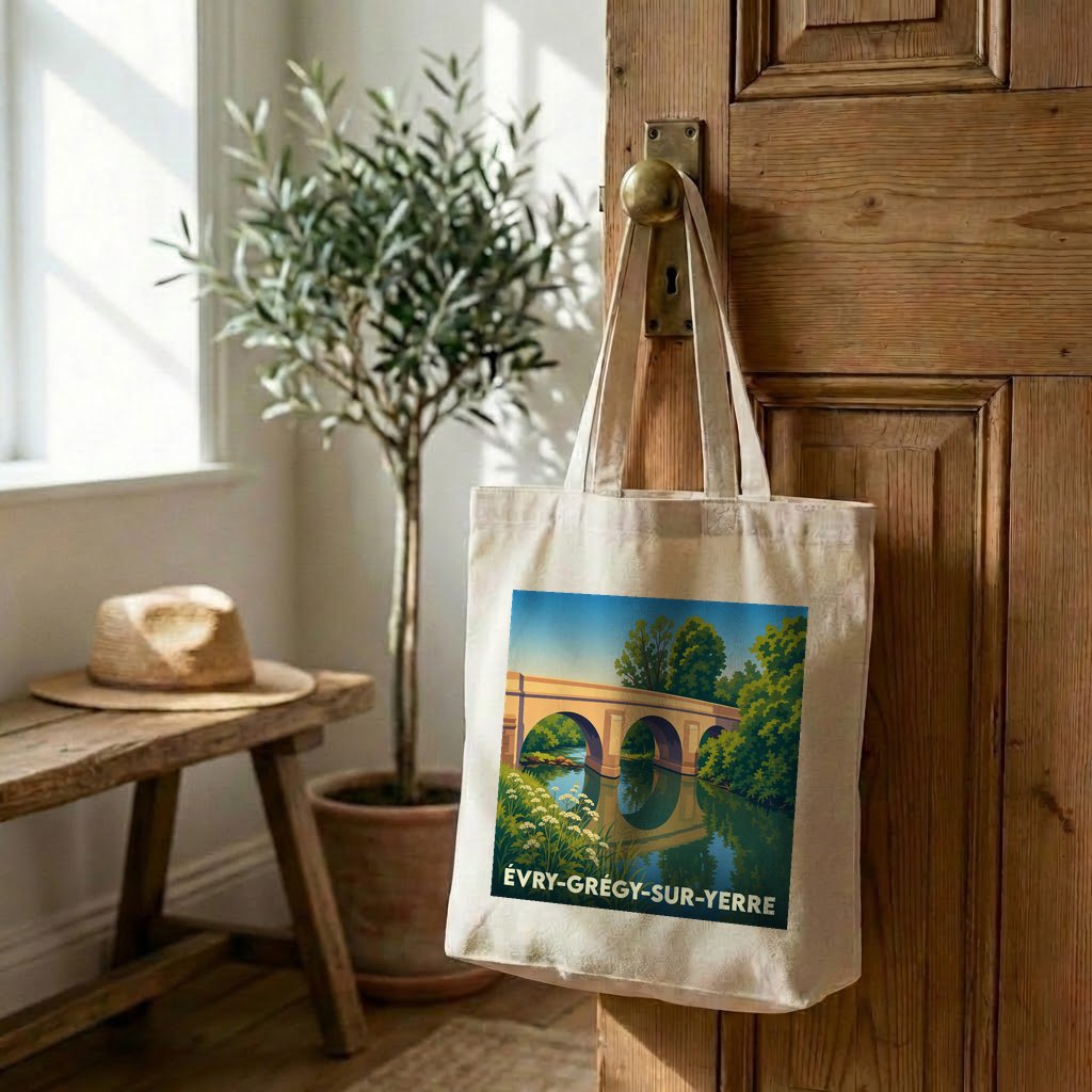 Tote bag souvenir de la ville de Évry-Grégy-sur-Yerre avec une illustration stylisée d'un pont en pierre.