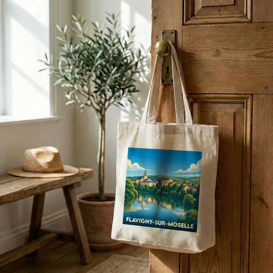 Tote bag souvenir de la ville de Flavigny-sur-Moselle avec une illustration stylisée.