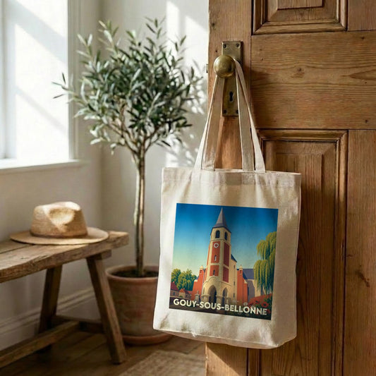 Tote bag souvenir de la ville de Gouy-sous-Bellonne avec une illustration stylisée d'église.