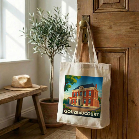 Tote bag souvenir de la ville de Gouzeaucourt avec une illustration stylisée d'un bâtiment historique.