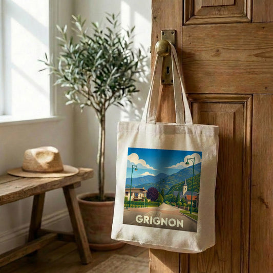 Tote bag souvenir de la ville de Grignon avec une illustration de paysage stylisée.
