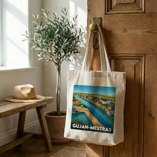 Tote bag souvenir de la ville de Gujan-Mestras avec une illustration stylisée.