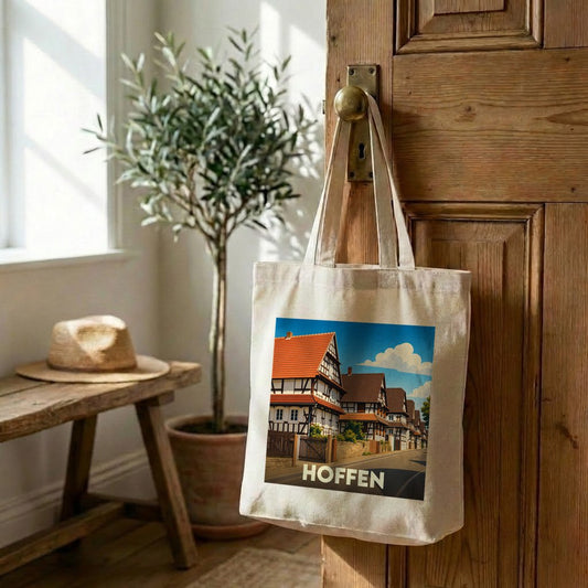 Tote bag souvenir de la ville de Hoffen avec une illustration de maisons à colombages.