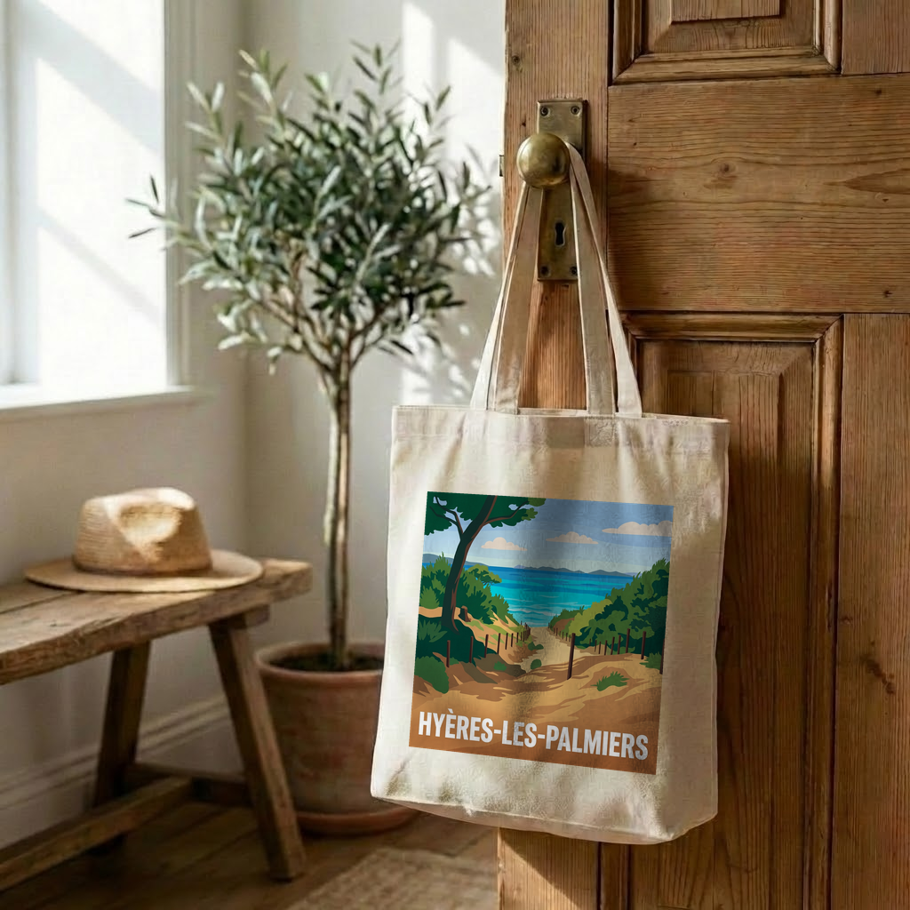 Tote bag souvenir de la ville de Hyères-les-Palmiers avec une illustration stylisée de bord de mer.