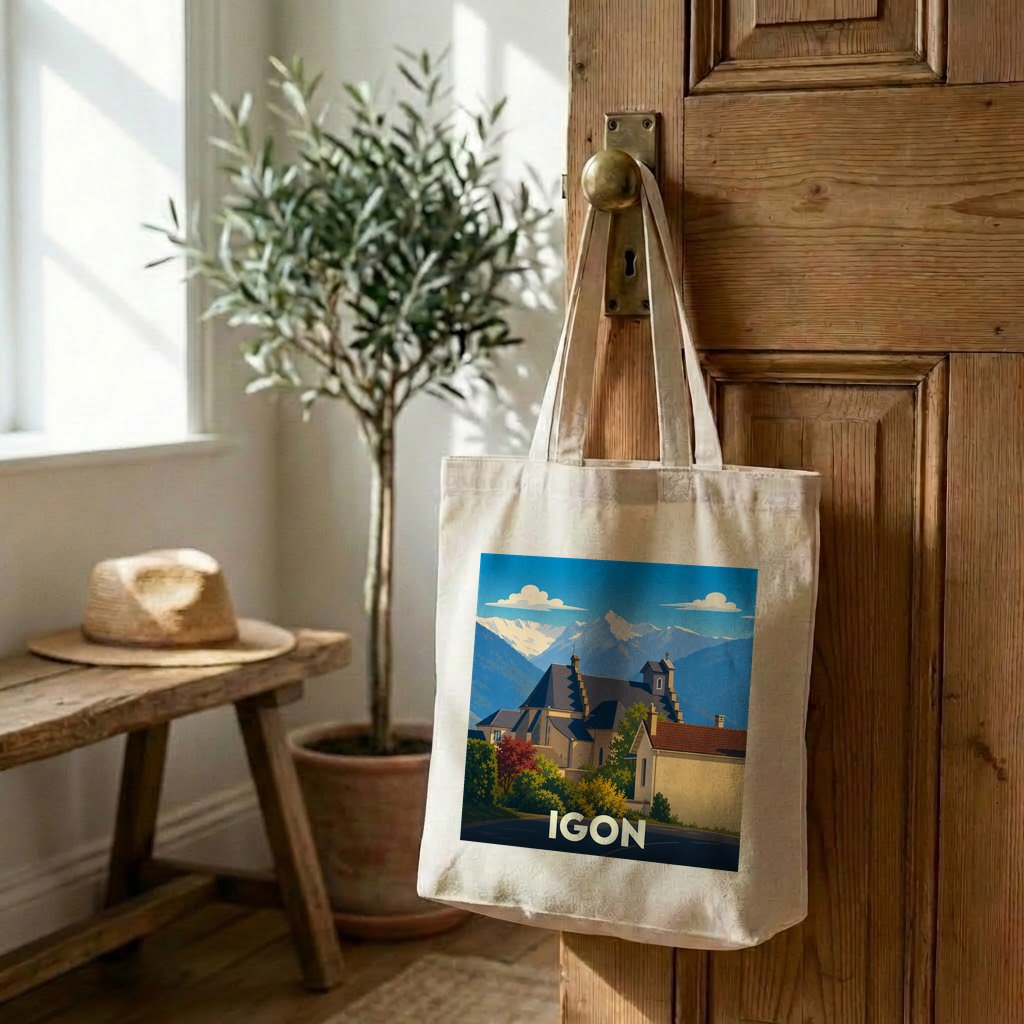 Tote bag souvenir de la ville d'Igon avec une illustration stylisée de montagne.