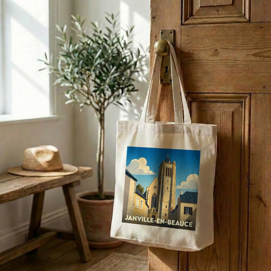 Tote bag souvenir de la ville de Janville-en-Beauce avec une illustration stylisée de son église.
