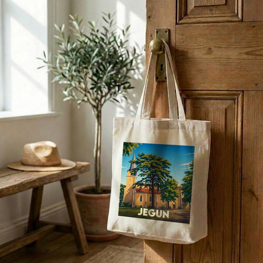 Sac cabas en toile souvenir de la ville de Jegun avec une illustration de son église.
