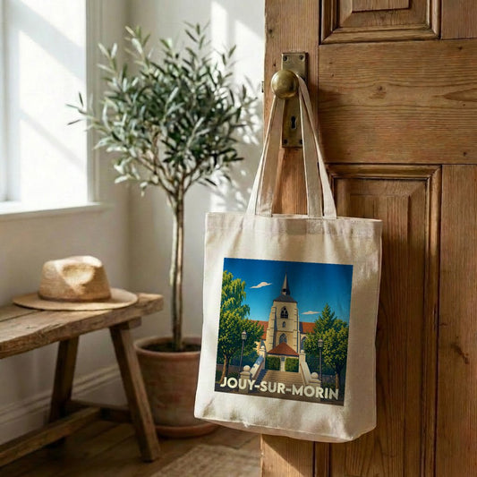 Tote bag souvenir de la ville de Jouy-sur-Morin avec une illustration stylisée de son église.