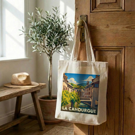 Tote bag souvenir de la ville de La Canourgue avec une illustration stylisée.