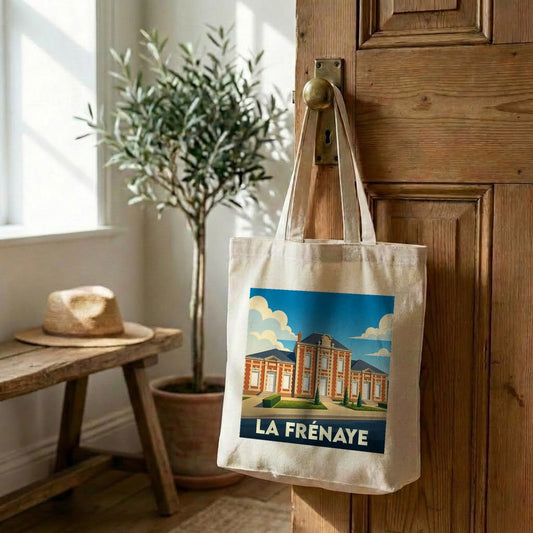 Tote bag souvenir de la ville de La Frénaye avec une illustration stylisée.