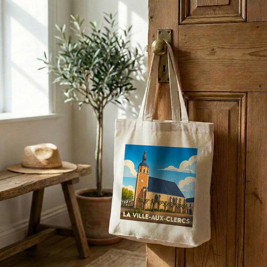 Tote bag souvenir de la ville de La Ville-aux-Clercs avec une illustration stylisée de son église.