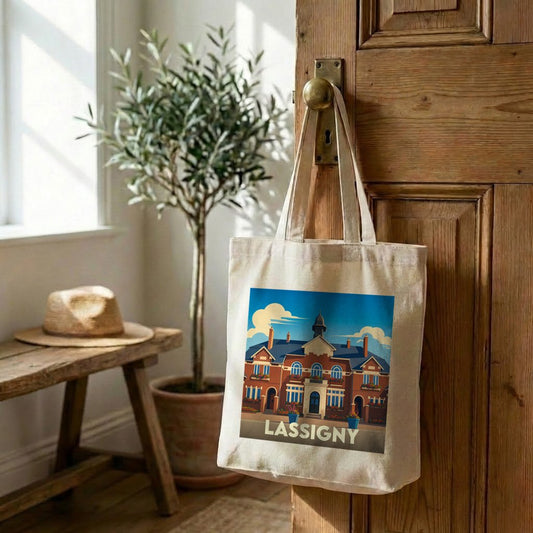 Tote bag souvenir de la ville de Lassigny avec une illustration stylisée de son architecture.