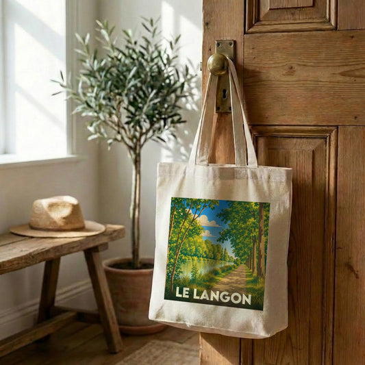 Tote bag souvenir de la ville de Le Langon avec une illustration stylisée de sous-bois au bord de l'eau.