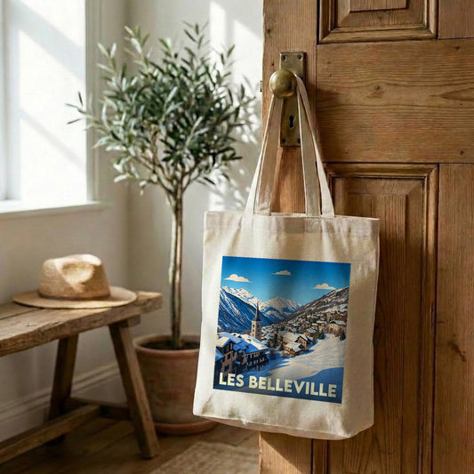 Tote bag souvenir de la ville de Les Belleville avec une illustration stylisée de montagne enneigée.