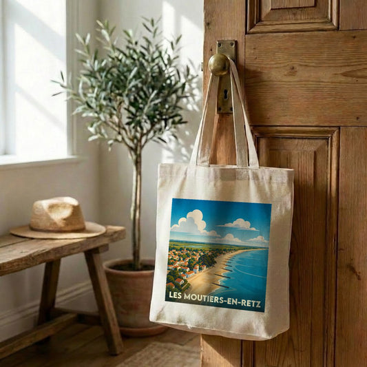 Tote bag souvenir de la ville de Les Moutiers-en-Retz avec une illustration stylisée de son bord de mer.