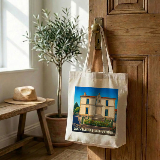 Tote bag souvenir de la ville de Les Velluire-sur-Vendée avec une illustration stylisée.