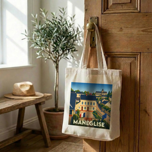 Tote bag souvenir de la ville de Manéglise avec une illustration stylisée.