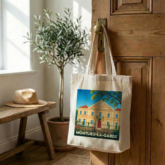 Tote bag souvenir de la ville de Montlieu-la-Garde avec une illustration stylisée d'un bâtiment historique.
