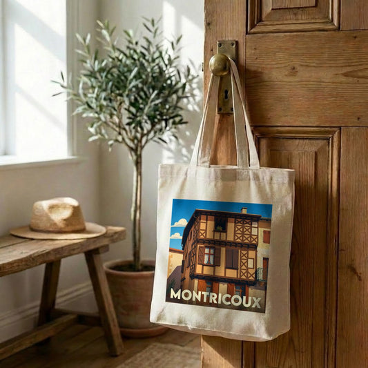 Sac cabas (tote bag) souvenir de la ville de Montricoux orné d'une illustration stylisée de maisons à colombages.