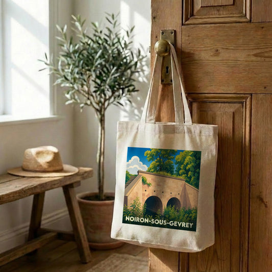 Tote bag souvenir de Noiron-sous-Gevrey avec une illustration stylisée d'un pont en pierre.