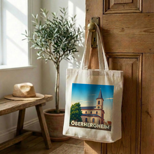 Sac en toile souvenir de la ville d'Oberhergheim avec une illustration stylisée d'une église.