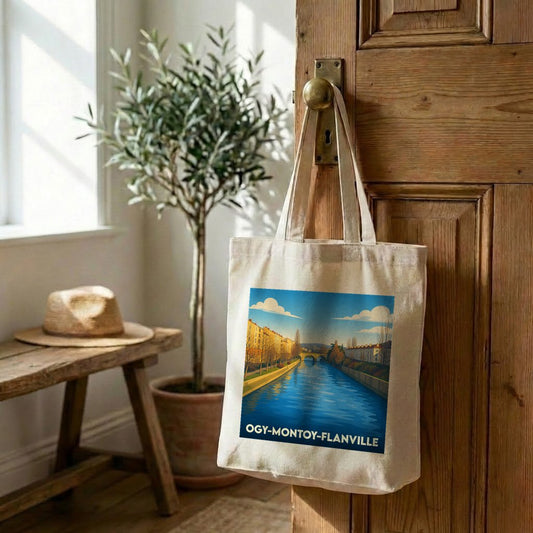 Tote bag souvenir de la ville d'Ogy-Montoy-Flanville avec une illustration stylisée.