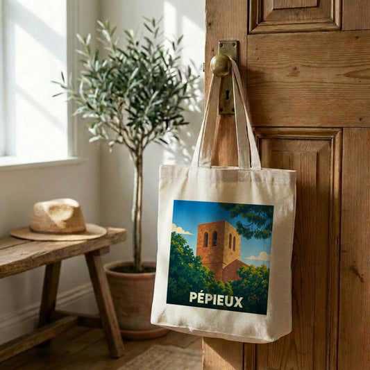 Tote bag souvenir de la ville de Pépieux avec une illustration stylisée d'un clocher entouré de végétation.