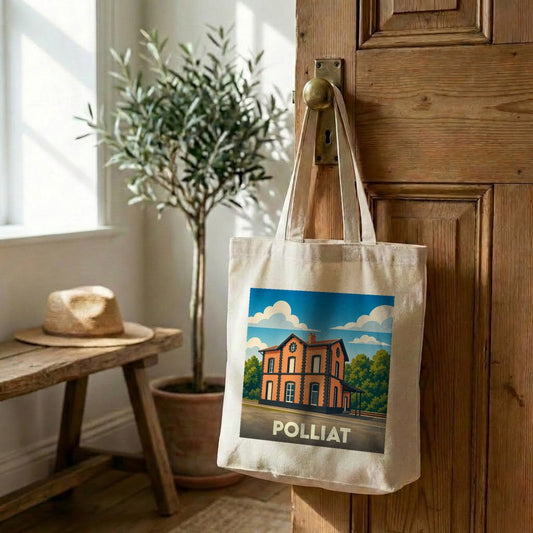 Tote bag souvenir de la ville de Polliat avec une illustration stylisée de sa gare.