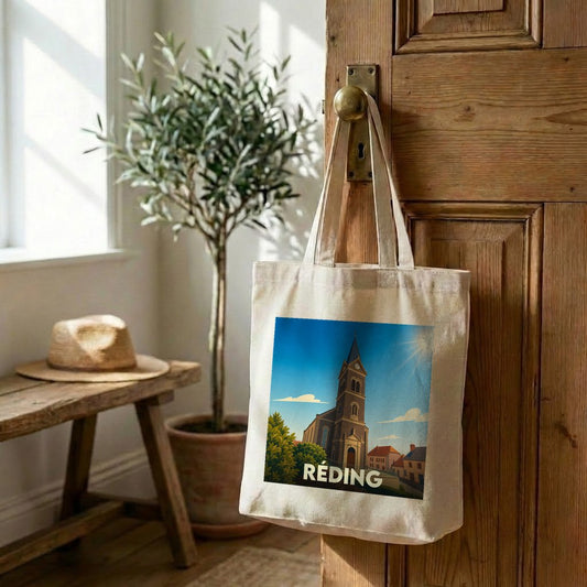 Tote bag souvenir de la ville de Réding avec une illustration stylisée de son église.