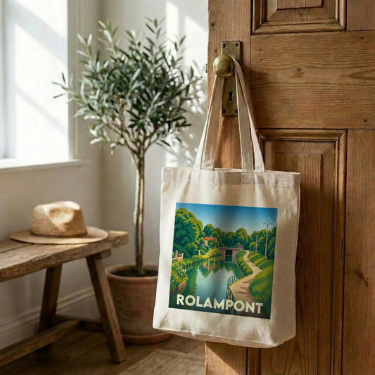 Tote bag souvenir de la ville de Rolampont avec une illustration stylisée d'un canal.