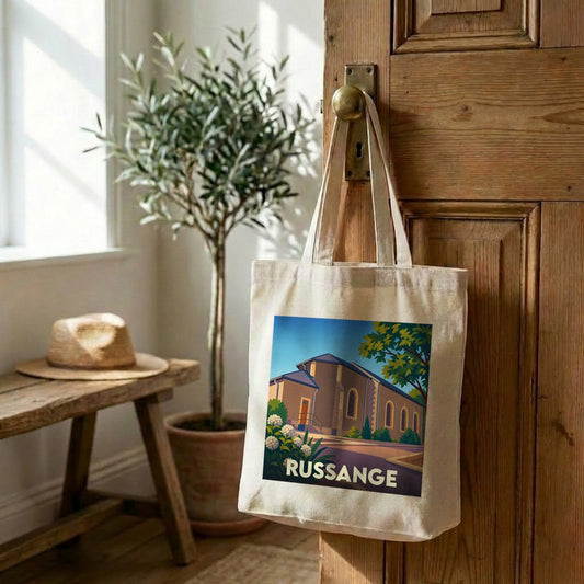 Tote bag souvenir de la ville de Russange avec une illustration stylisée.
