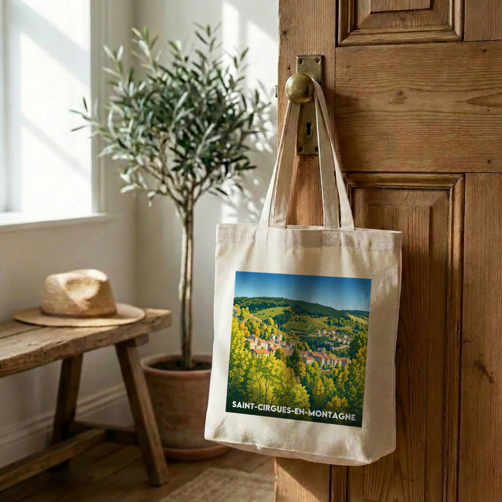 Tote bag souvenir de la ville de Saint-Cirgues-en-Montagne avec une illustration stylisée.