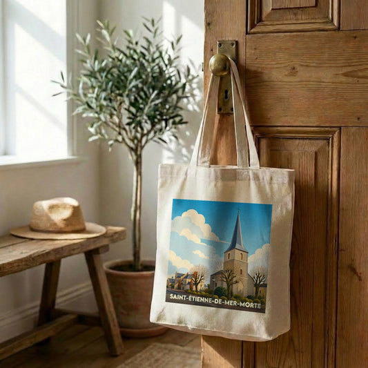 Tote bag souvenir de la ville de Saint-Étienne-de-Mer-Morte avec une illustration stylisée de son église.